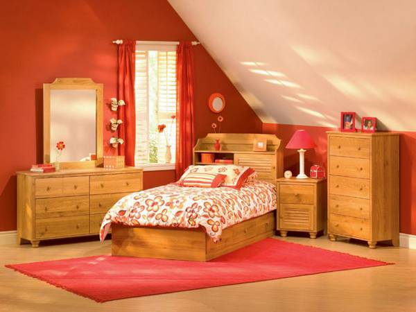 Quarto em tons de laranja para as meninas
